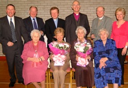 Pictured at a dinner in Magheragall Parish Church Hall to mark the 20th anniversary of the Senior Citizens’ Club are: (seated) Elizabeth Hill, Maureen Cheevers, Kitty McCluskey and Annie Maginnis.  (back row) Bobby Cunningham, Rev Raymond McKnight, Rev Nicholas Dark, Rt Rev Alan Harper - Bishop of Connor, Rev Canon Alec Cheevers and Sharon Cunningham.